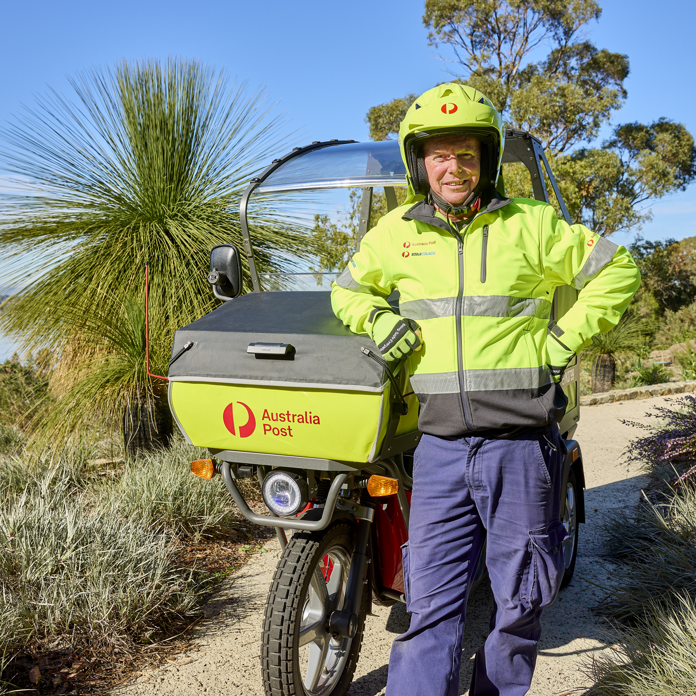EDV postie standing in front of his EDV in Kings Park, Perth