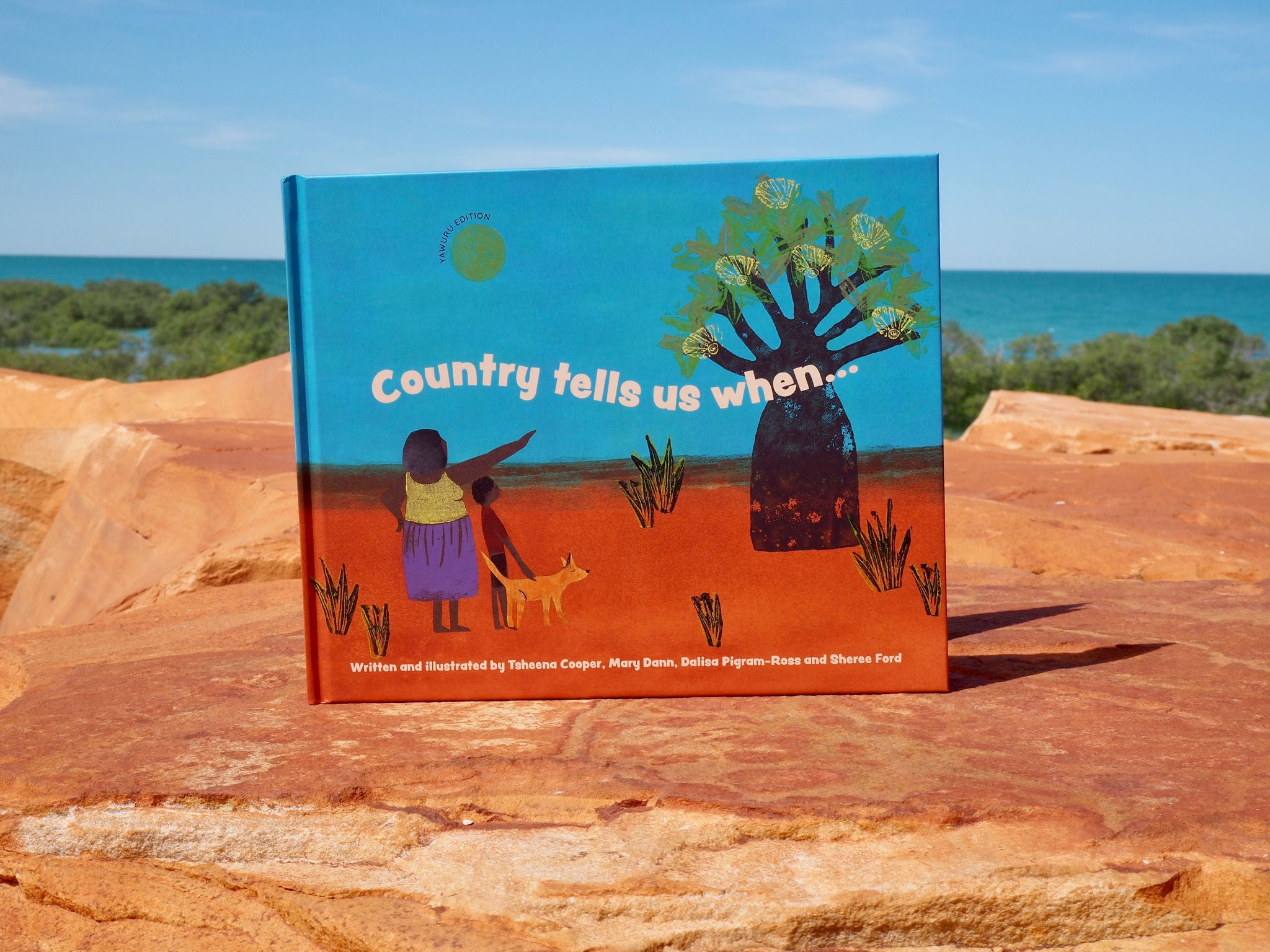 A photo book with the title Country tells us when