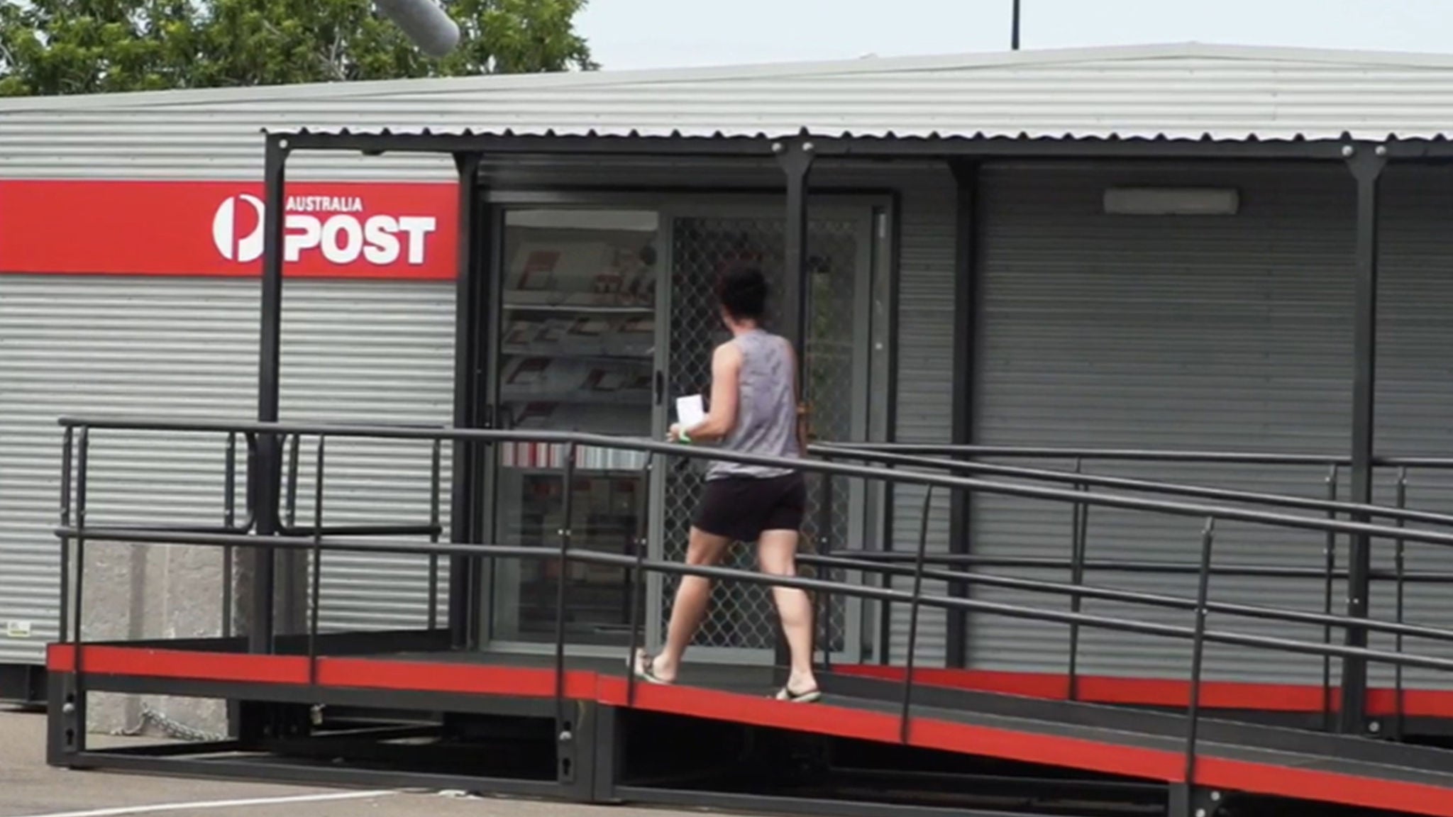 photo-temporary-post-office-corrugated-iron-metal-ramp